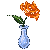 orange Rose in teardrop crystal vase